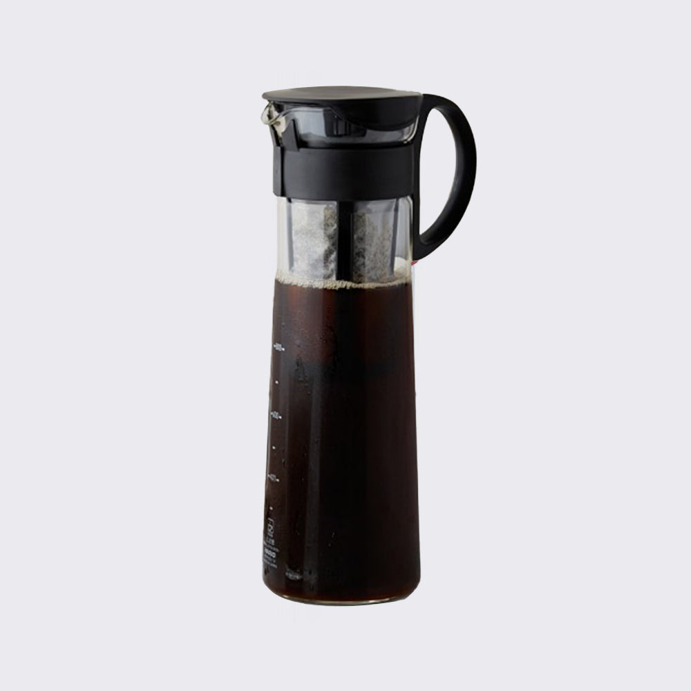 A black Hario Cold Brew 'Mizudashi' Coffee Maker with a glass carafe and plastic handle and lid.